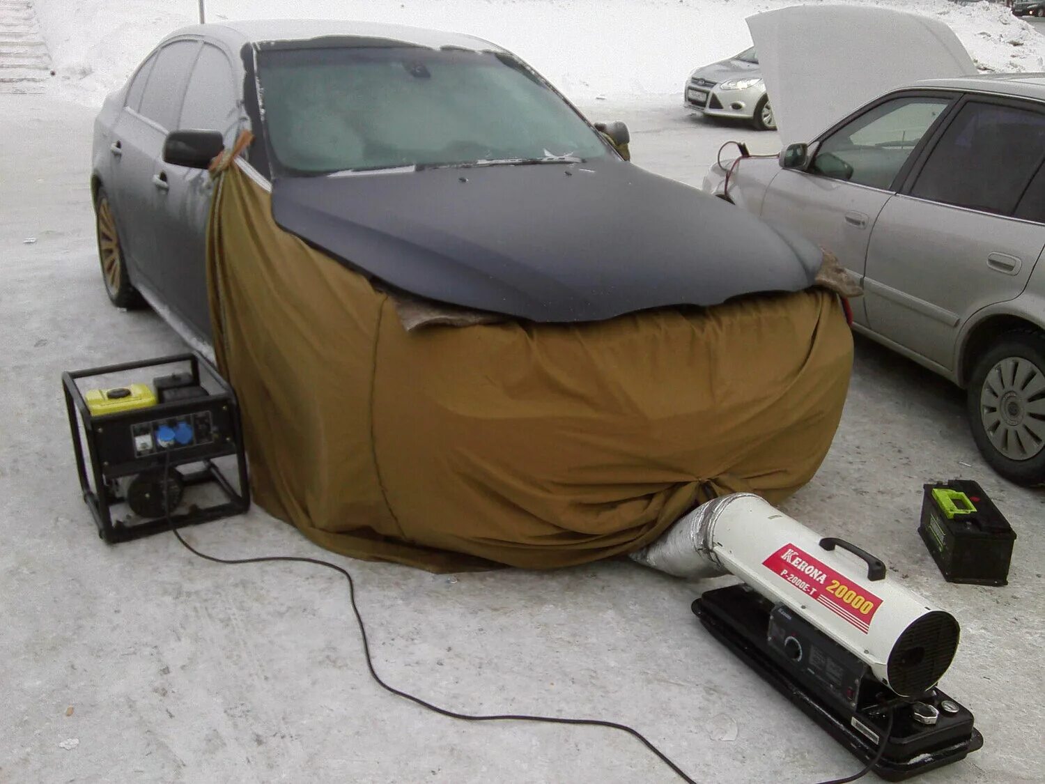 тепловая пушка в машину. отогрев авто москва дизельных. отогрев автомобиля. труба для паяльной лампы для отогрева авто. разогрев авто.