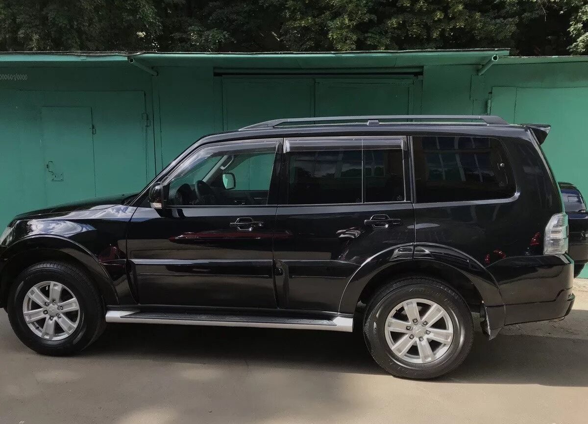 Mitsubishi Pajero 2012. Митсубиси Паджеро 2012 черная. Mitsubishi Pajero 2012-2014. Митсубиси Паджеро 2012 2013. Mitsubishi pajero 2012 год