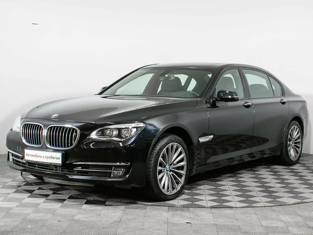 Бмв 750 москва. BMW 750li f02 Black. BMW 750li XDRIVE. BMW 7 2014. BMW 750li XDRIVE f01.