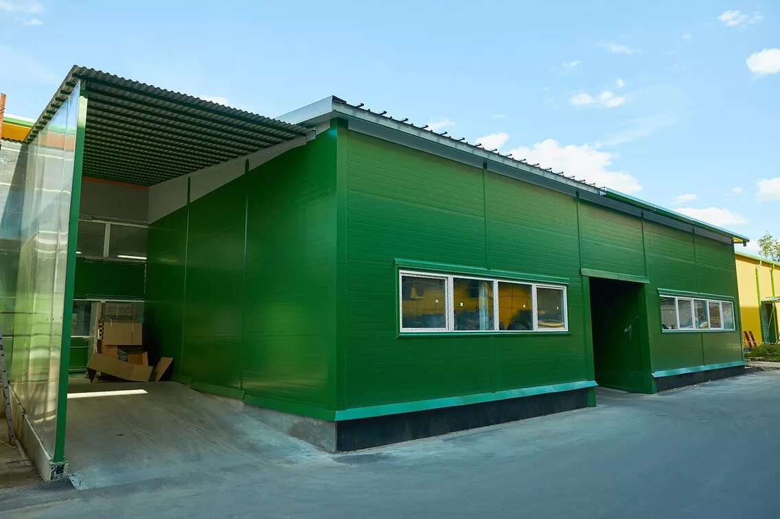 Стеновые сэндвич панели промздание. Рал 7005 склад сэндвич панели. Фасадные сэндвич панели ruukki. Сэндвич здания. Промышленное здание панельное сэндвич.