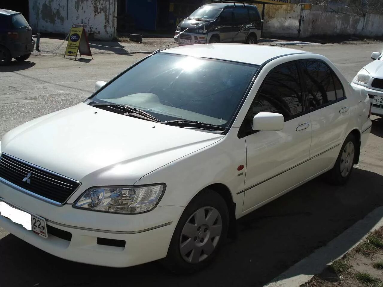 Lancer cedia 2001. Mitsubishi Cedia 2001. Лансер Цедиа 2001. Митсубиси Лансер 2001.