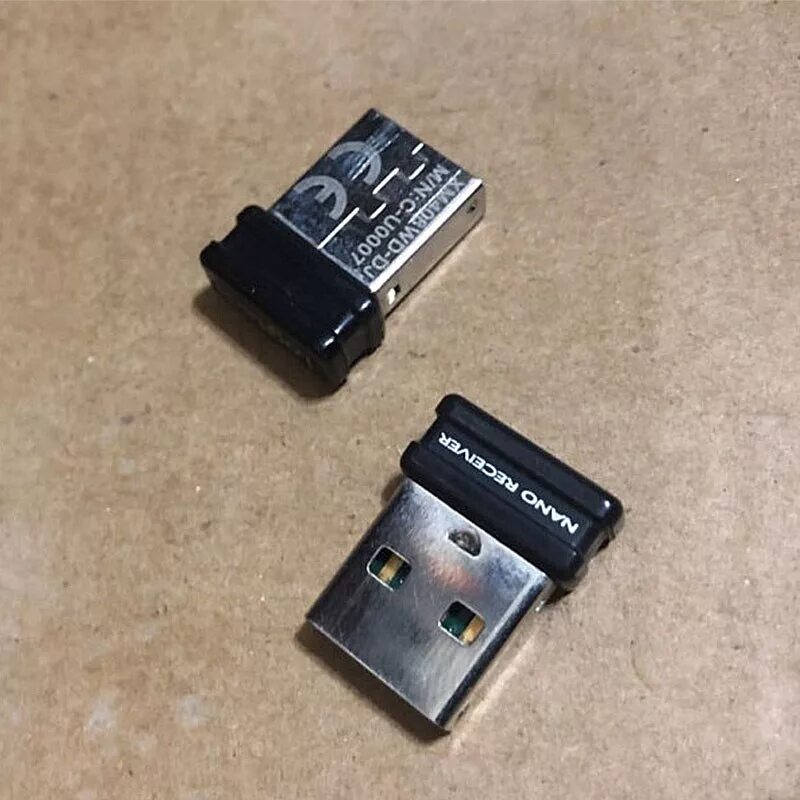 Logitech nano receiver. Адаптер logitech f710. адаптер геймпад logitech f710. флешка logitech mini receiver. блютуз адаптер для геймпада f710.