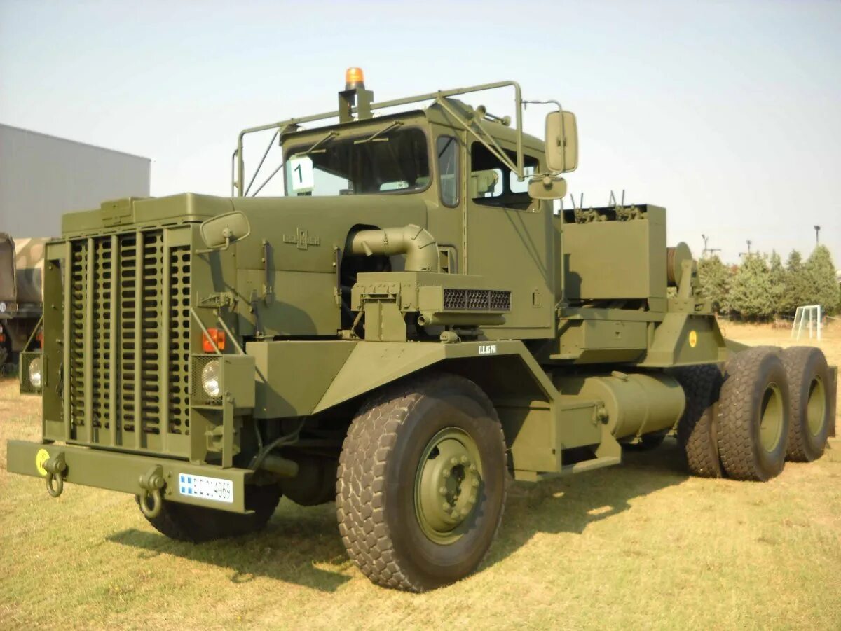 Тягач м. Oshkosh m911. тягач ошкош м911. грузовик ошкош 911. oshkosh m911 самосвал.