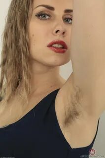 Beautiful Margaret reveals her fuzzy pits and unshaved pussy - 2 of 16.