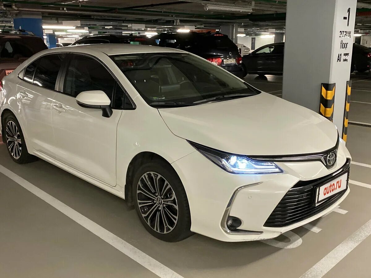 Toyota corolla e210. Corolla xii. Королла 12 поколения. Тайота карола 12 поколение. Новая toyota corolla 2021.