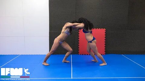 Four girl wrestlers challenge each other in a terrific sequence of 100% com...