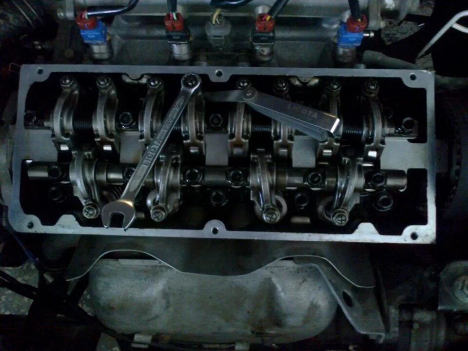 Регулировка клапанов лансер 9. Mitsubishi Lancer 9 1.6 4g18 двигатель клапана. Регулировка клапанов Мицубиси 4g15. Регулировка клапанов 4g15 12 клапанов. Mitsubishi Lancer 4g15 регулировка клапанов 16 клапанов.