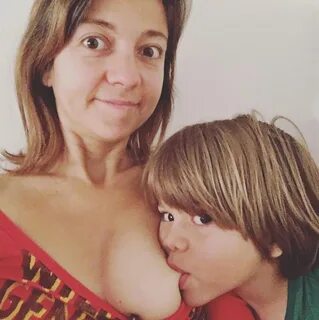 Ana Garcia and her son Matteo, who she breastfeeds on demand and shares a b...