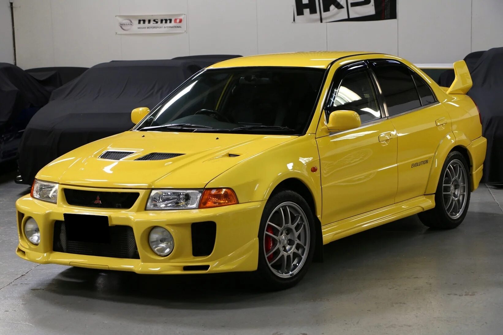 Эво фото. Mitsubishi lancer evo 5. mitsubishi lancer evolution 5 поколение. мицубиси лансер эволюшн 9. mitsubishi lancer evolution 1998.
