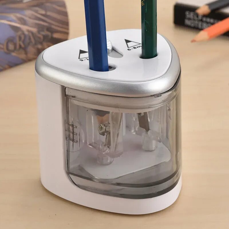 Какая точилка для карандашей лучше. Electric pencil sharpener точилка. точилка для карандашей pencil sharpener. комус электрическая точилка для карандашей. точилка электрическая electric pencil sharpener mf988361-855475.