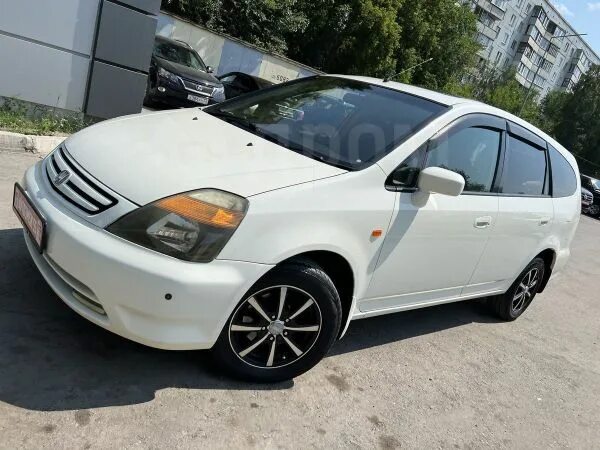 Хонда стрим 2011 белый. Ford focus 1 универсал. Хонда стрим 2003. Хонда стрим 2002 фото. Хонда стрим 2002 руль.