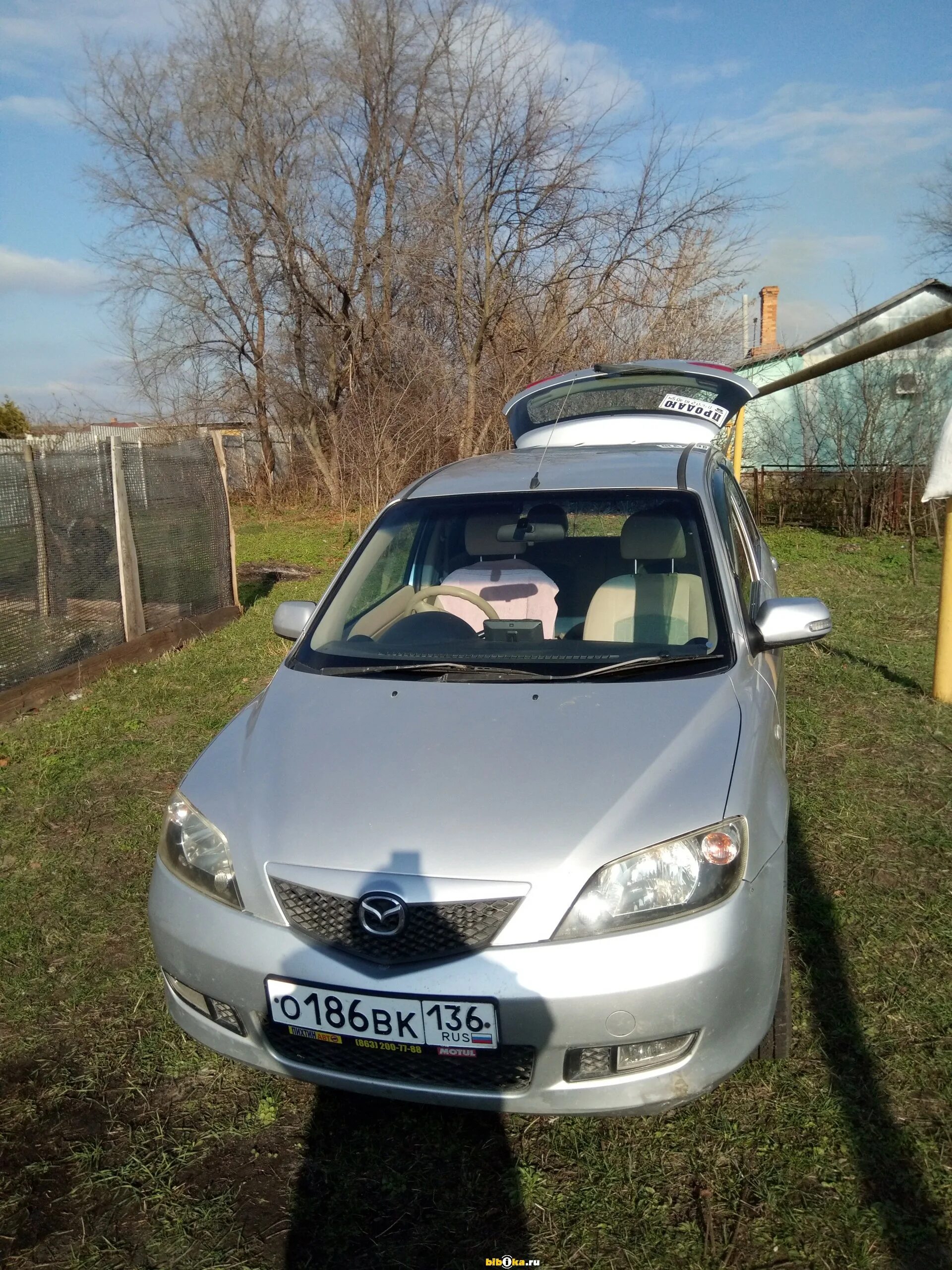 Мазда демио 1 поколение. Мазда Демио 2003г. Mazda Demio 1.3 at, 2003. Мазда Демио 1 Рестайлинг.