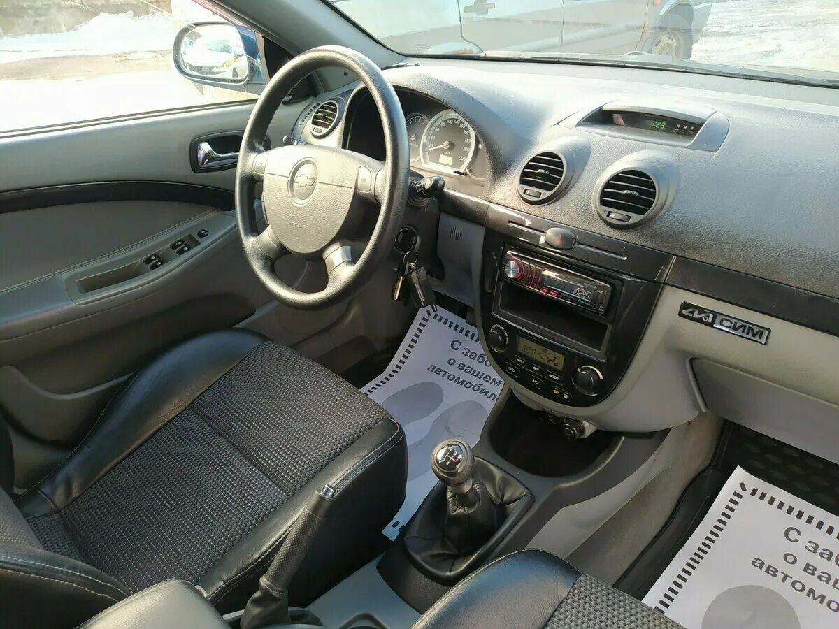 Лачетти универсал салон. Chevrolet Lacetti 2008 салон. Chevrolet Lacetti 1.6 MT, 2008. Комплектация Шевроле Лачетти седан 1 6 2008 MT Platinum. Chevrolet Lacetti 2004-2013 салон.