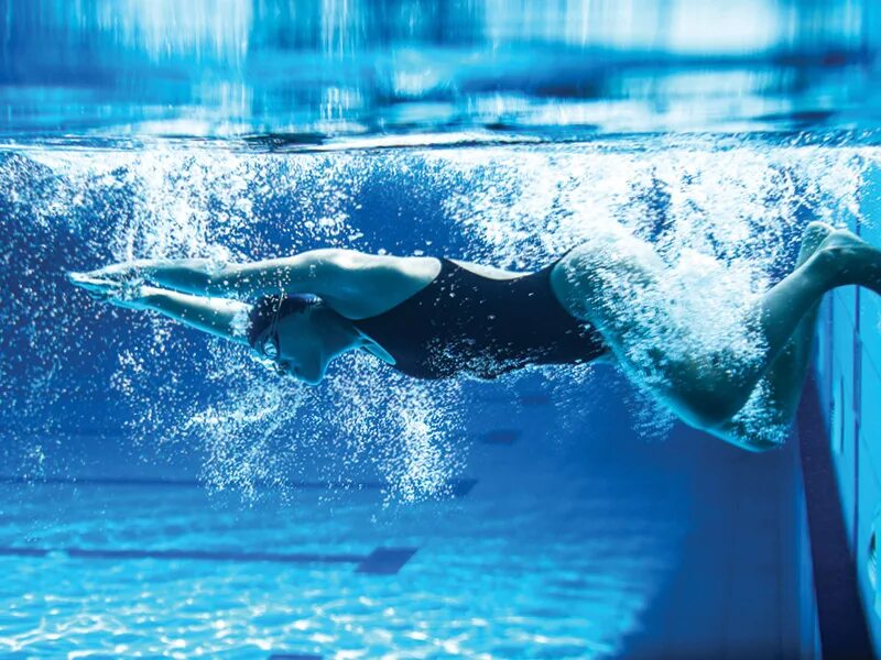 He swims in the pool. He swims in the pool