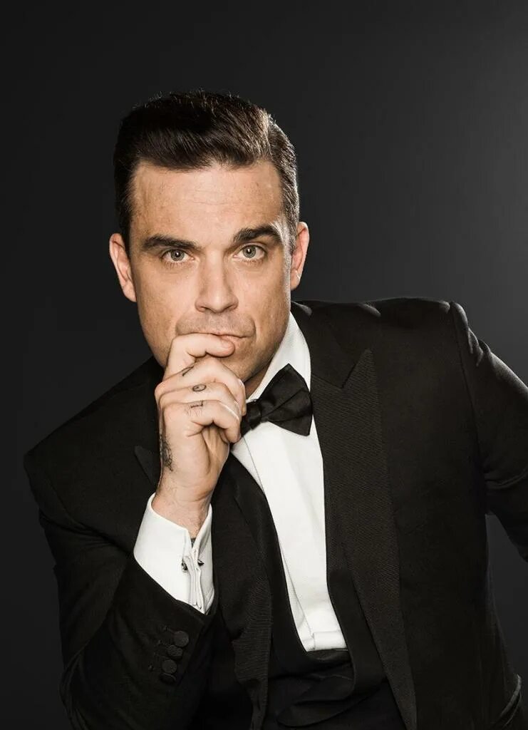 Робби. Robbie Williams. Английский певец Робби Уильямс. Робби Уильямс певец фото. Знаменитые исполнители песен