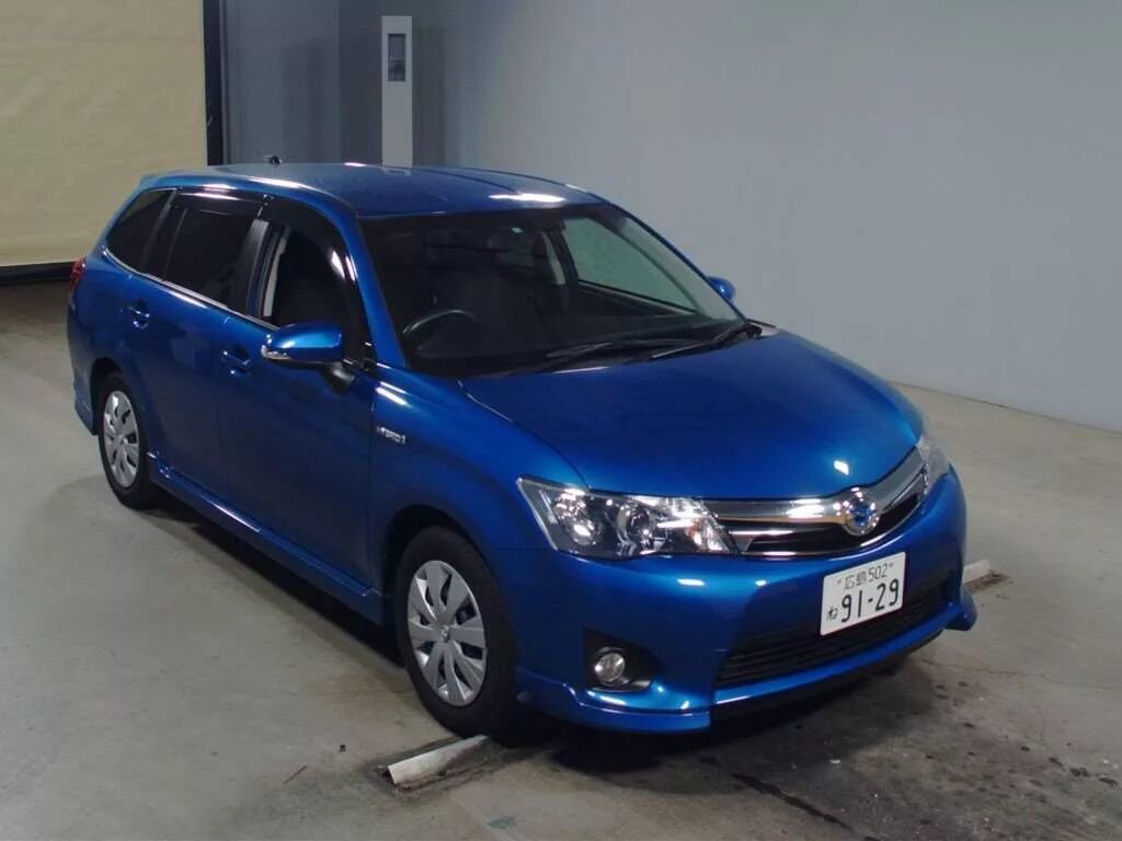 Toyota Corolla Fielder Hybrid 2013. Toyota Corolla Fielder гибрид. Тойота Королла Филдер 2013 гибрид. Тойота Королла Филдер 2013.