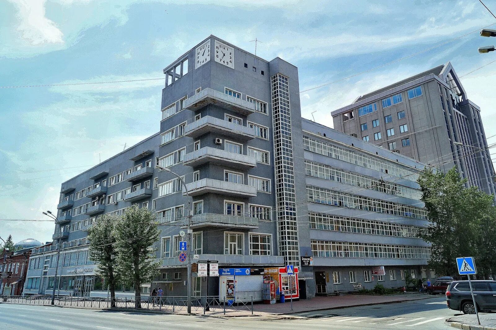 Конструктивизм новосибирск. Дом с часами новосибирск фото. Красный проспект 11 новосибирск. Дом с часами на красном проспекте новосибирск. Дом с часами на красном проспекте новосибирск.