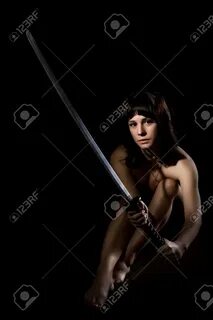 Nude women with swords