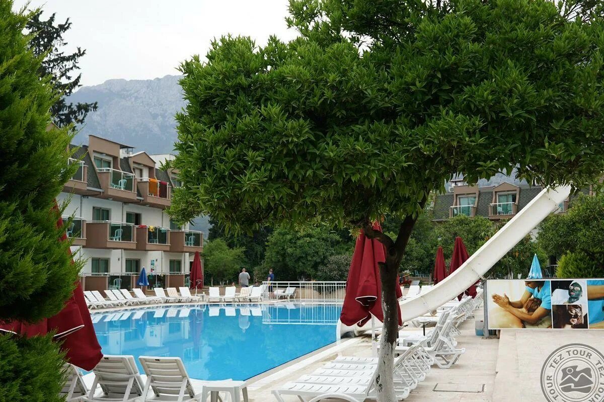 Omorfi garden resort hotel. Beralisa garden resort hotel. Omorfi garden resort hotel 4 турция. батонт гарден резорт турция кемер. Batont garden resort 4.