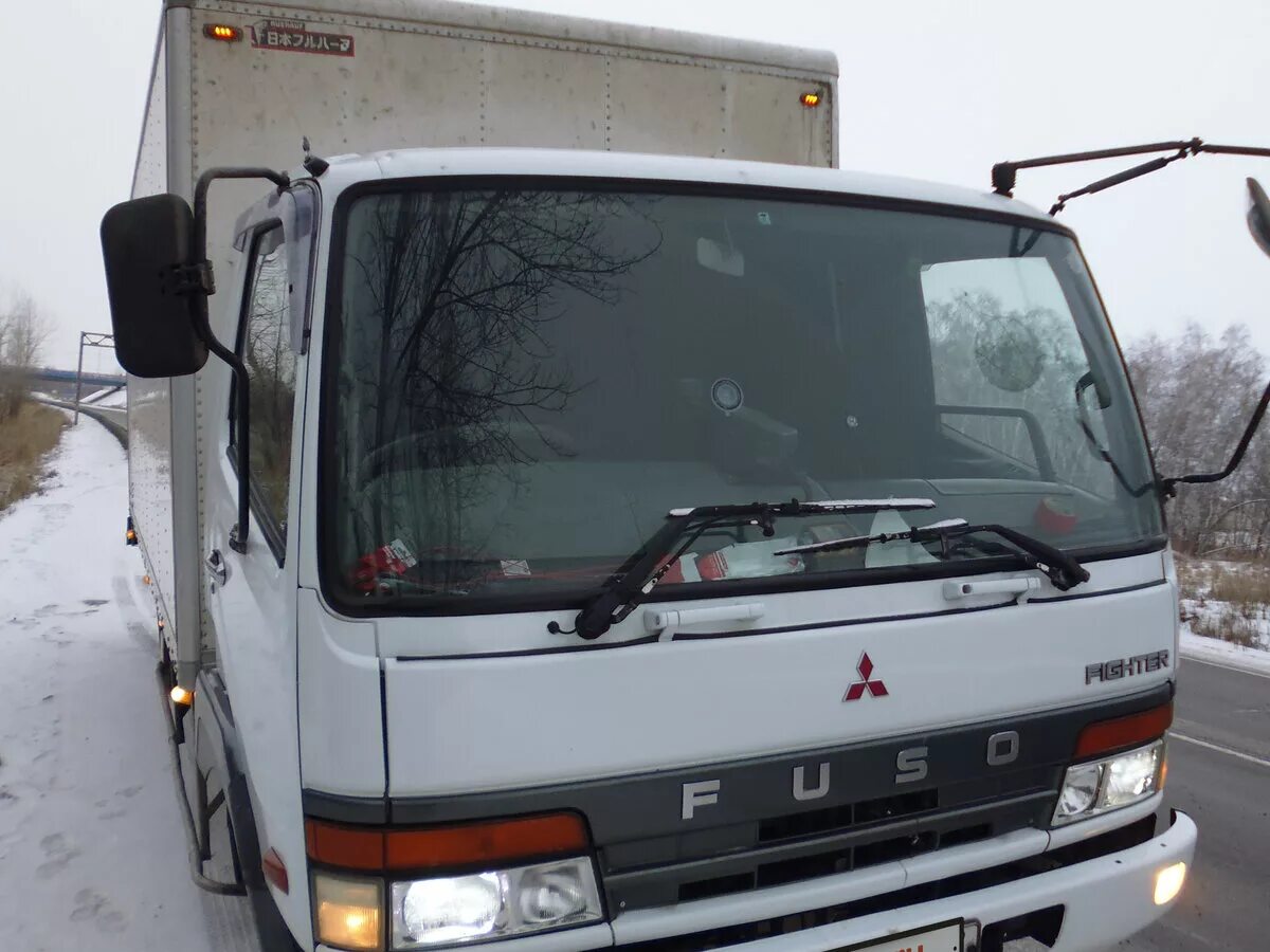 Mitsubishi fuso fighter 2000 года. Седельный тягач с манипулятором митсубиси фусо 6х6. Митсубиси фусо 1995. Митсубиси фусо 2014. Фусо файтер 1990.