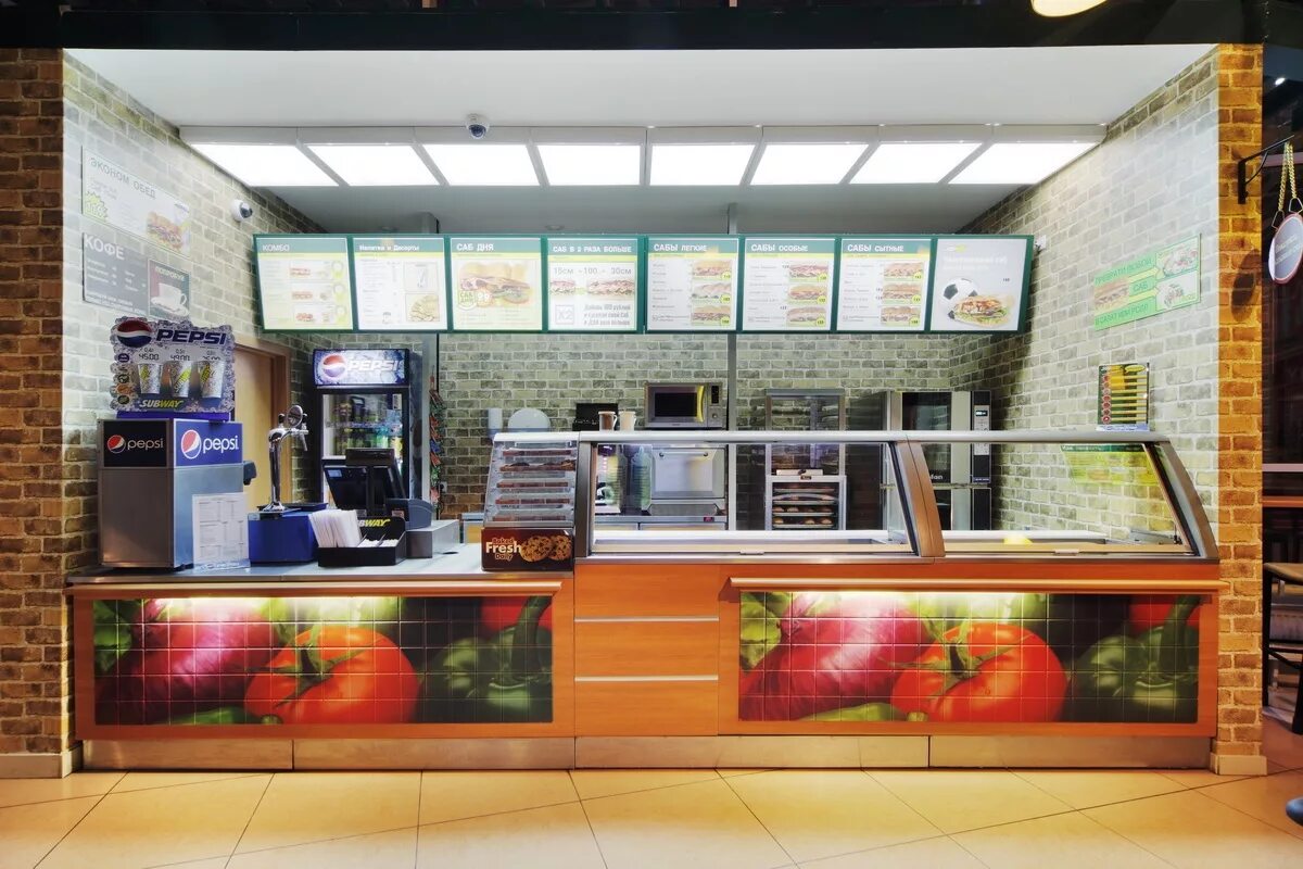 зона фудкорта. ресторан быстрого питания. фаст фуд на улице. стойки для фаст фуда. ресторан быстрого питания.