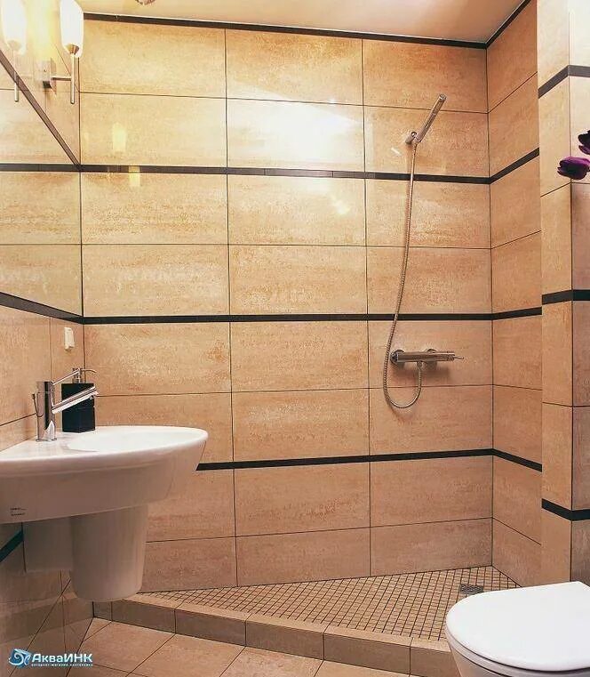 Плитка для ванной на стены лучше. Вертикальная плитка в ванной. Крупная плитка в ванной. Однотонная плитка в ванной. Крупная плитка в маленькой ванной.