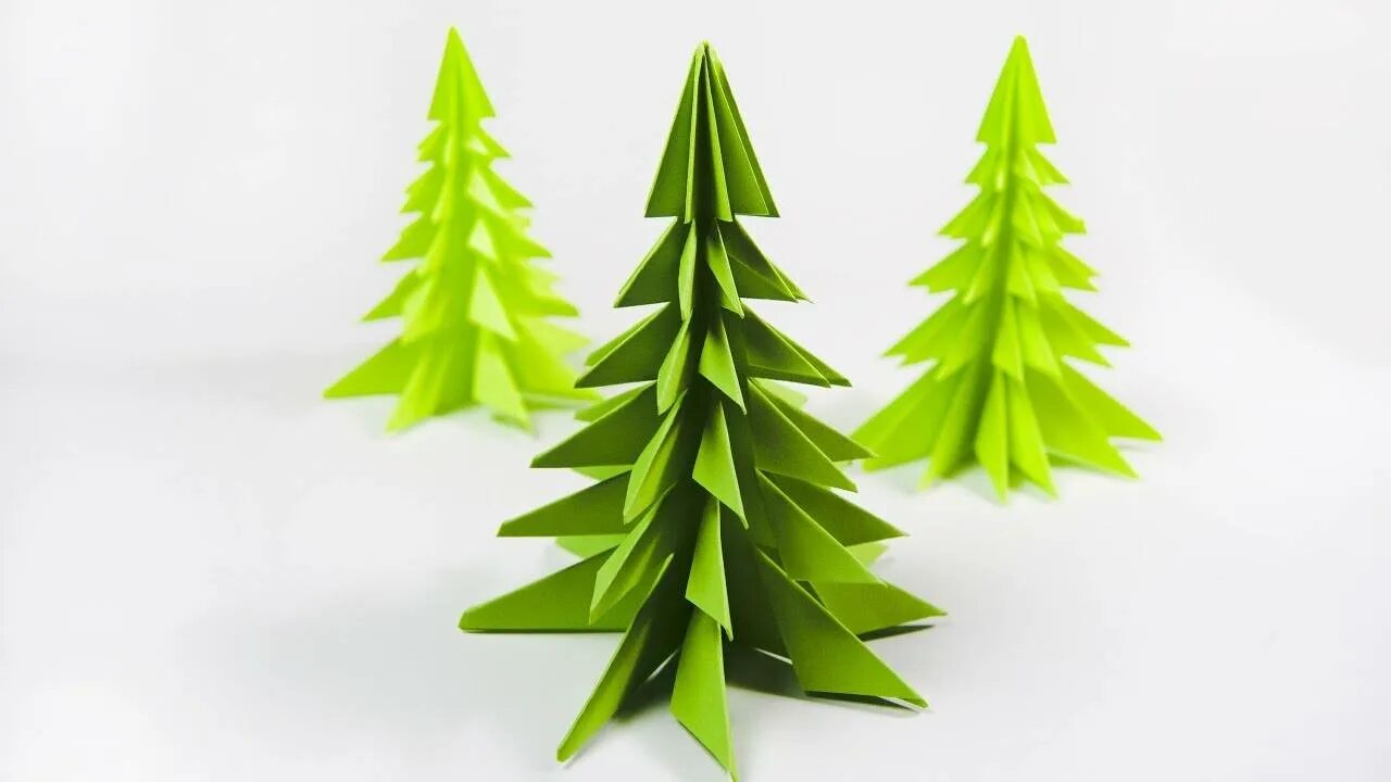 Елка оригами из бумаги. Оригами ель. устойчивая елка из бумаги. оригами елка плоская. елка из бумаги надрезы.