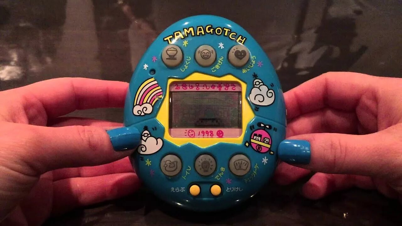 Включи видео тамагочи. Tamagotchi 1998. Тамагочи 3 кнопки. Тамагочи Бандай. Тамагочи алиен.