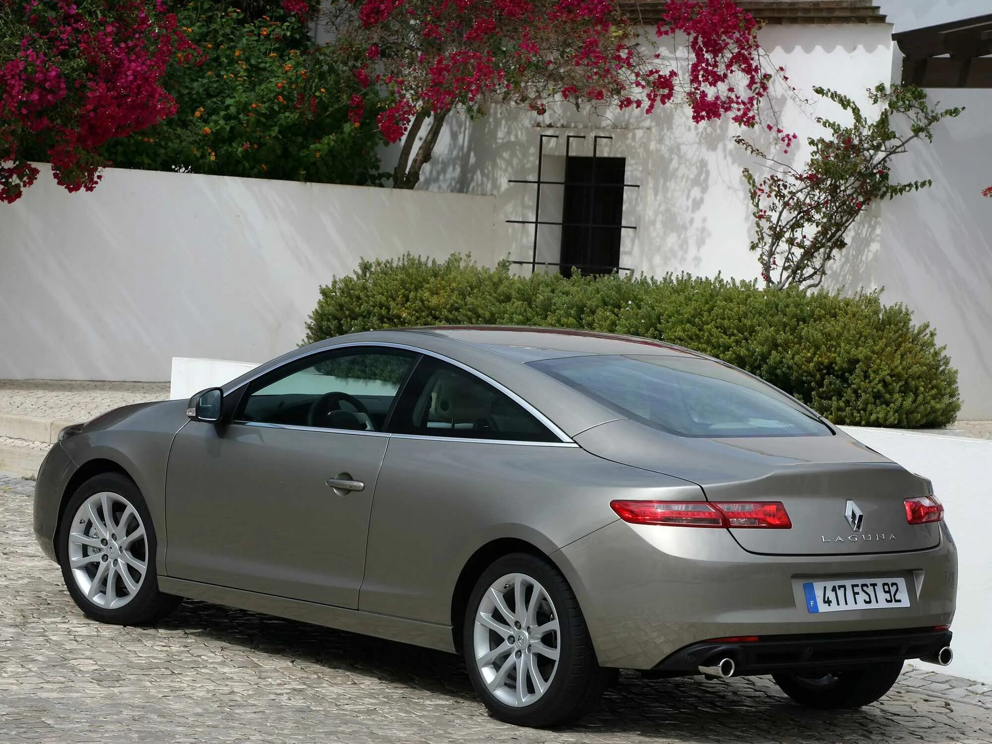 Купе фото. Renault Laguna Coupe 2008. Renault Laguna 3 Coupe. Renault Laguna Coupe 2012. Рено Лагуна купе 2008.