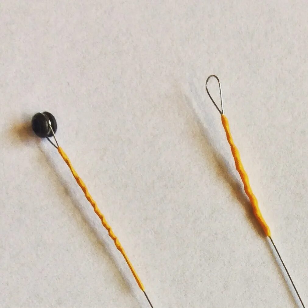 String end. String loop to ball ends. end of string.