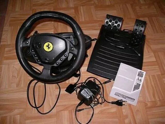 Thrustmaster ferrari force. Руль Thrustmaster Ferrari ps2/PC. Thrustmaster Enzo Ferrari FFB 2960640. Руль Thrustmaster Enzo Ferrari. Thrustmaster f1 Force feedback блок питания.