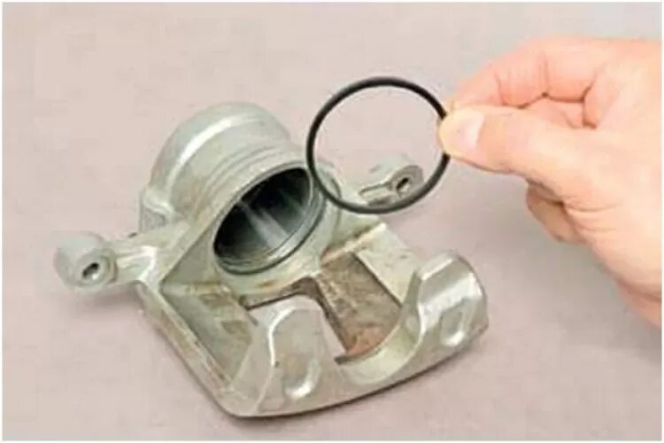 Ремкомплект тормозного суппорта шевроле лачетти. Суппорт тормозной ларгус. Стопорные кольца задних суппортов гольф 4. Кольцо тормозного суппорта. Кольцо тормозного суппорта.