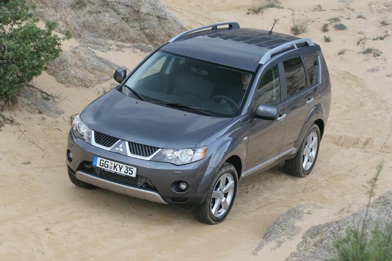 Мицубиси аутлендер хл бу. Мицубиси аутлендер хл бу. Mitsubishi outlander xl 2012. Мицубиси аутлендер 2007 года черный. Обзор mitsubishi outlander 2 рестайлинг.