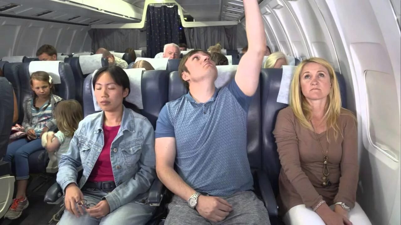 Passengers on a plane. Flying on a plane. Man on the plane. Группа Passengers фото. The plane showed the passengers