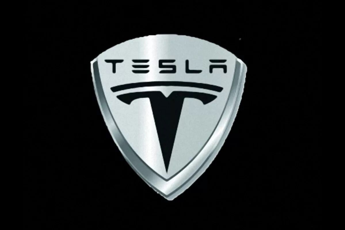 Тесла лого. Tesla Motors 2003. Tesla Motors логотип. Тесла знак.