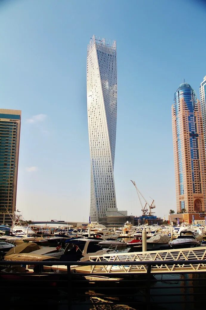 Башня кайан дубай. Cayan tower дубай. башня кайан тауэр. infinity tower дубай. витой небоскреб в дубай.
