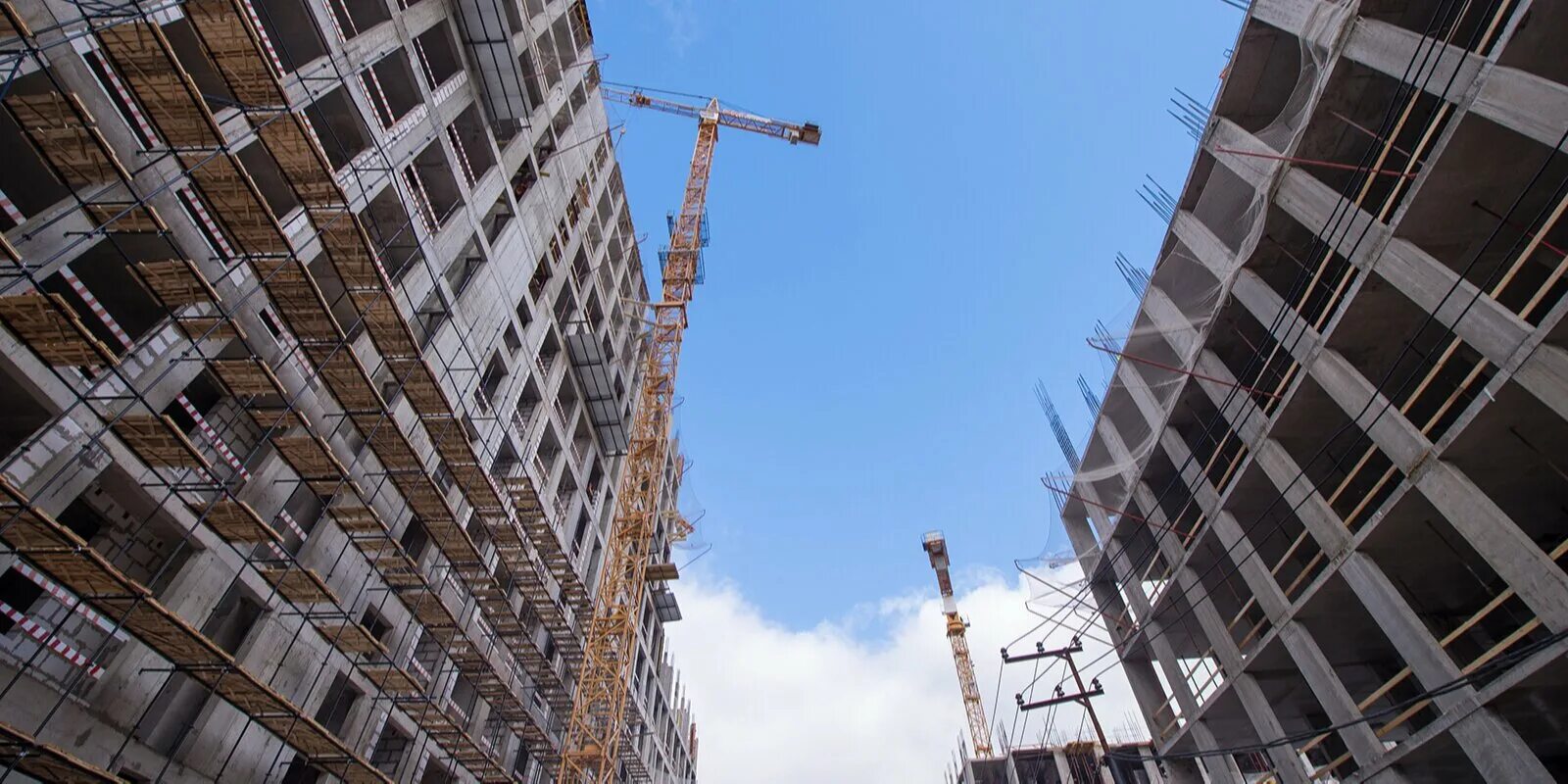 2 5 млн кв м. Строительство жилья. Что такое квадратный метр в строительстве. Строящееся жилье. Стройки в ростовской области 2021.