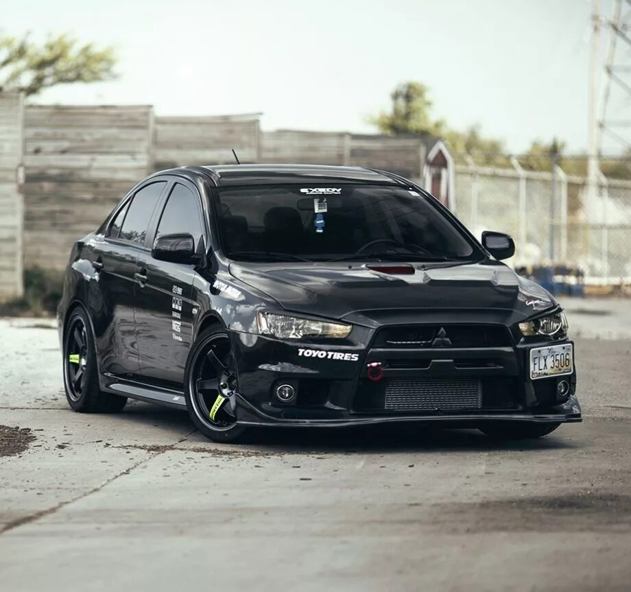 Evo tuning. Мицубиси Лансер 10 Эволюшн. Mitsubishi Evolution 10. Mitsubishi Lancer Evolution x 10. Митсубиси Лансер Эволюшн 10 черный.