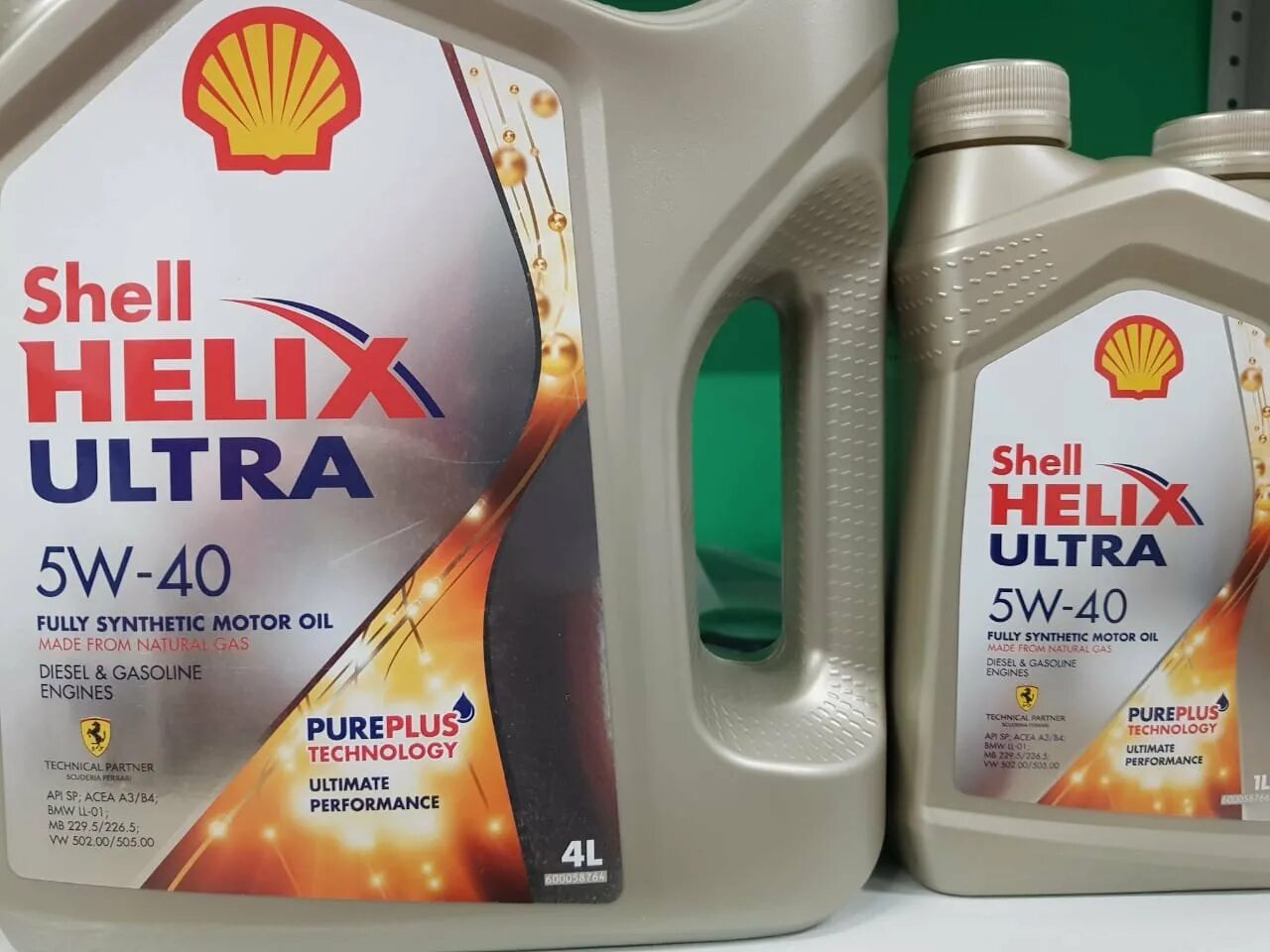 Shell Хеликс ультра 5w40. Shell 5w40 синтетика. Shell Helix Ultra 5w40 API SP. Масло Shell Helix Ultra 5 в 40.