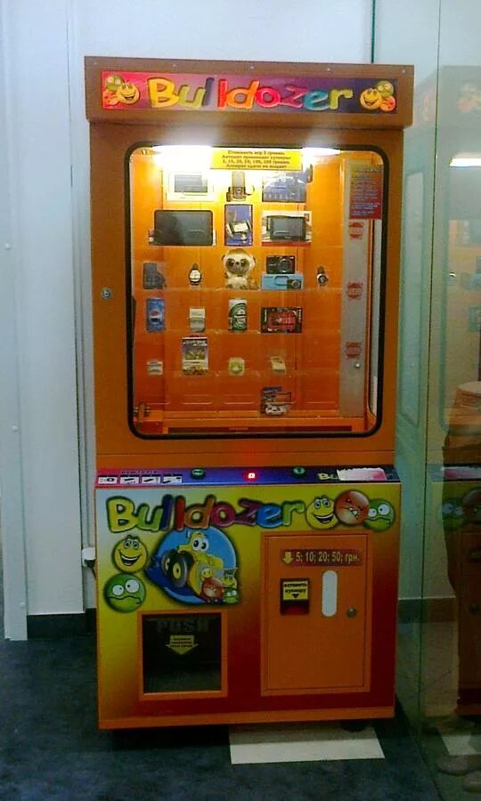 Автомат толкатель алладин. Игровой аппарат marksman. Игровые автоматы на деньги. Игровые автоматы где можно выиграть игрушку. Игровые автоматы где можно выиграть игрушку.