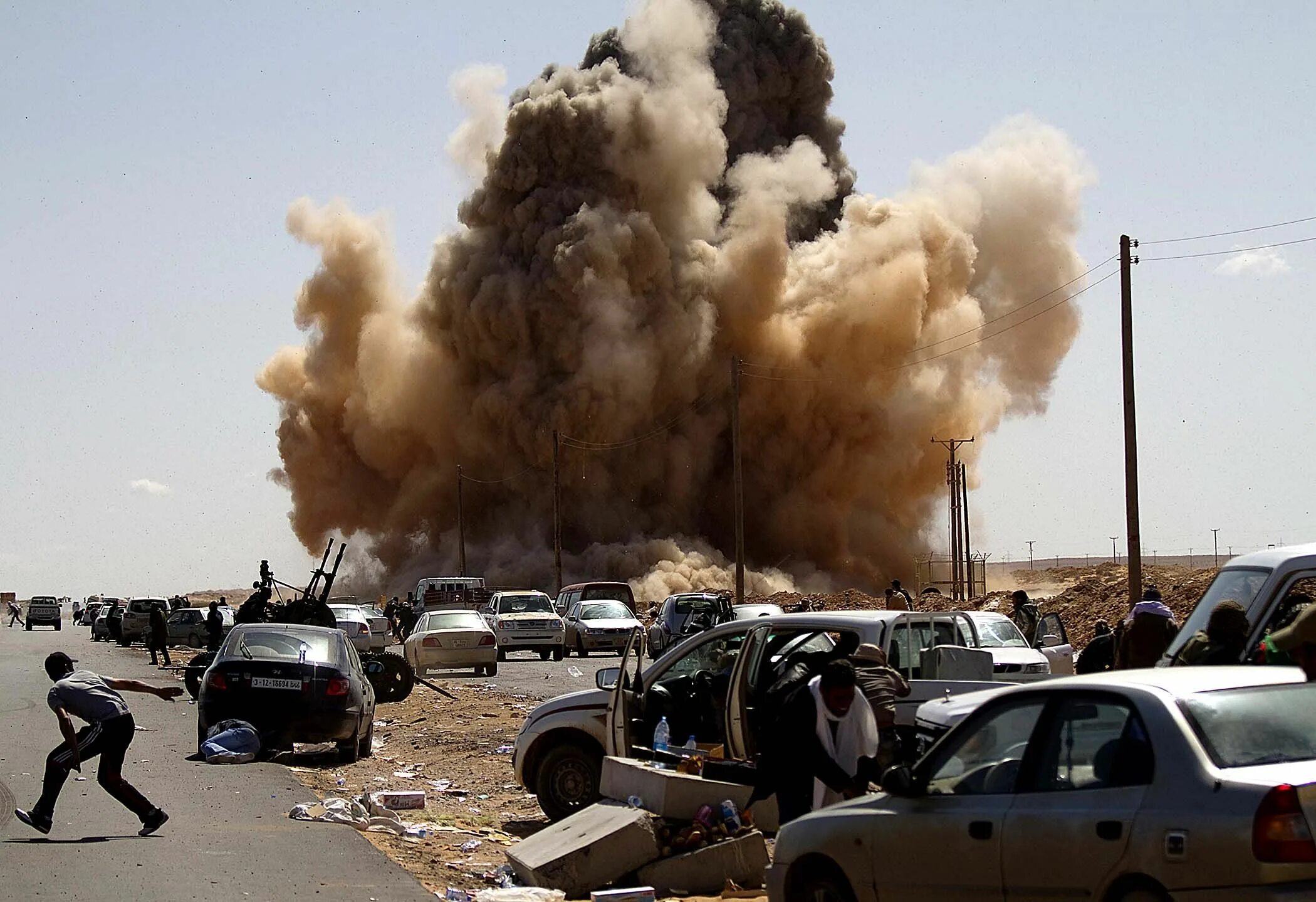 Нападение на ливию. НАТО В Ливии 2011 Каддафи. Бомбардировки Ливии НАТО 2011. Триполи Ливия 2011. Бомбардировки Триполи 2011.