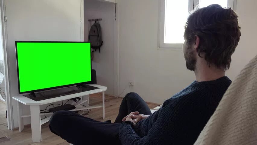 Green watching TV. Person watching Television Green background.