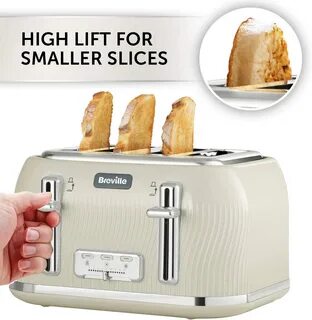beige kettle and toaster set. 