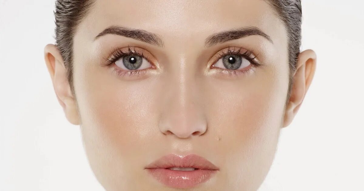 землистый цвет лица.