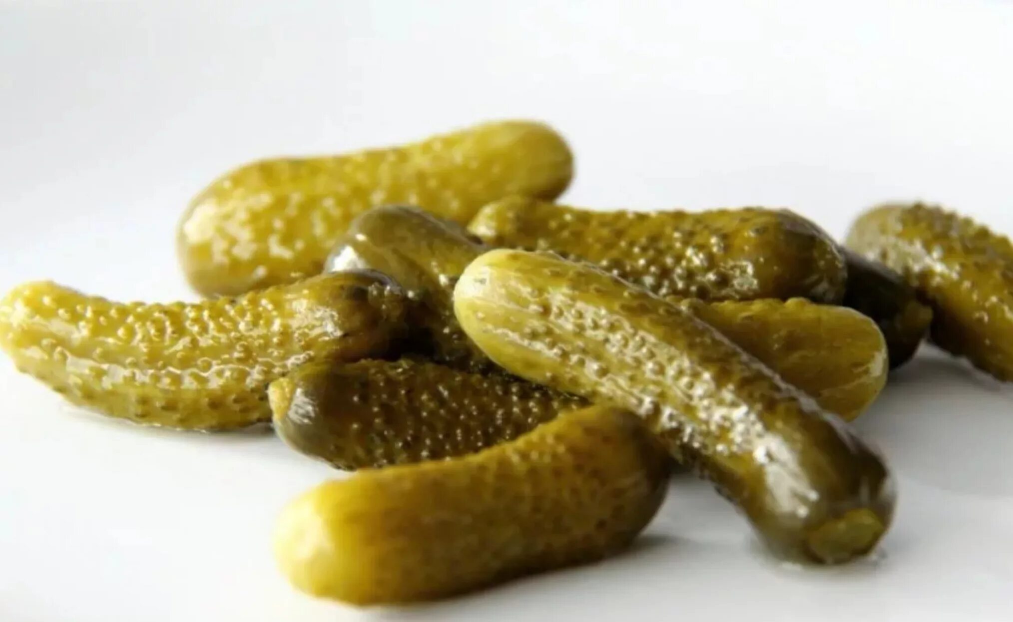 Маринованные огурцы мелкие. Огурцы корнишоны пикули. Огурцы маринованные пиканта корнишоны. Маринованные огурцы мелкие. Банки с огурцами.