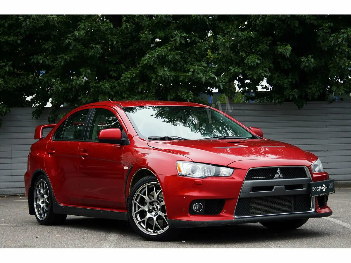 Митсубиси лансер 2.0 купить. Mitsubishi Lancer Evolution x 2008. Митсубиси Лансер 2. Лансер 10 2.0. Лансер 10 Эволюшн красный.