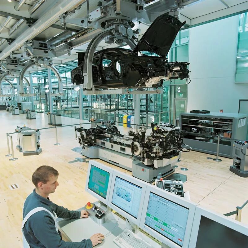 Где собирают телефоны. Завод Фаэтон в Дрездене. Автомобильный завод Volkswagen Дрезден. Завод Фольксваген в Германии Дрезден. Завод Фольксваген Фаэтон в Германии.