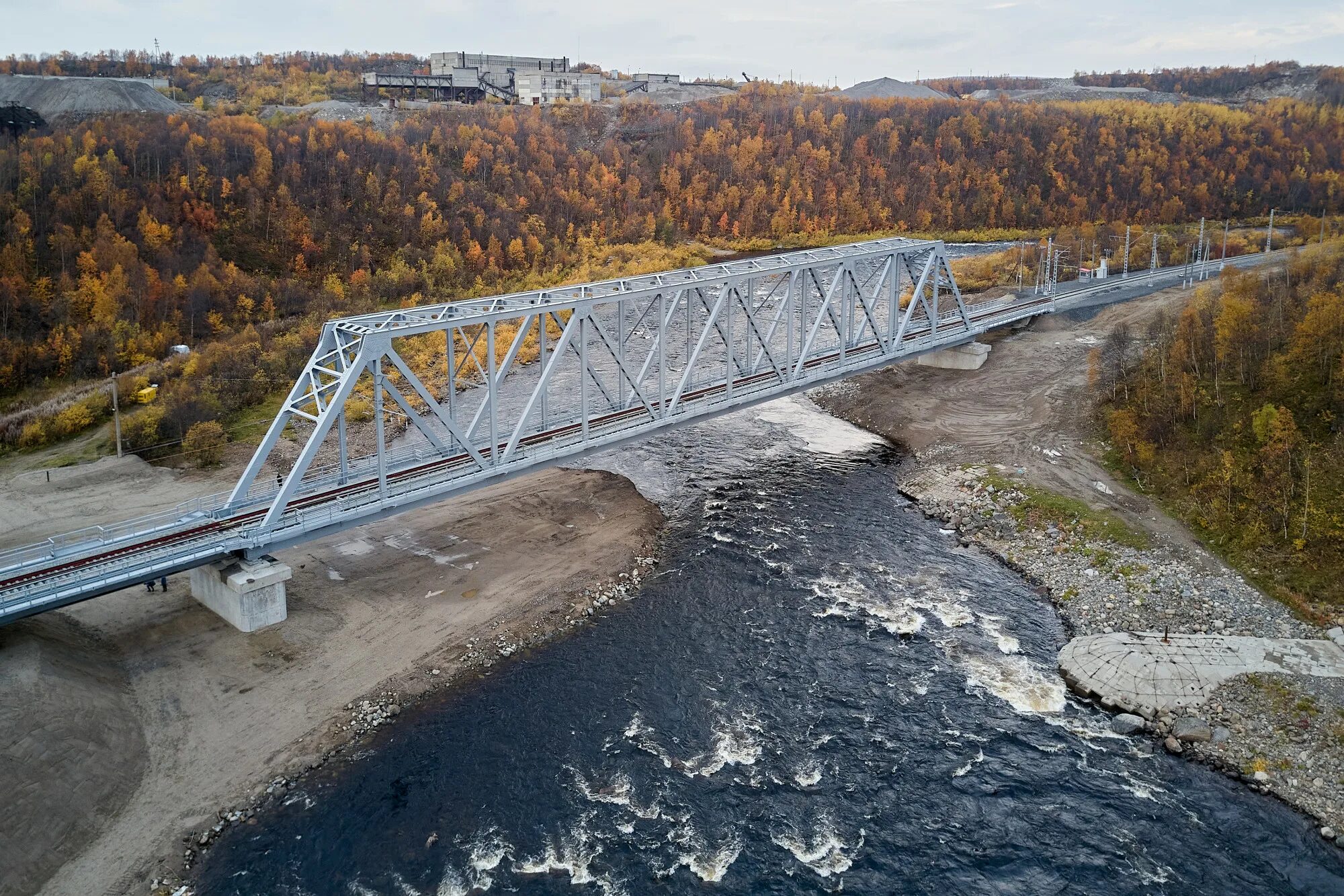 Мост через час. Новый мост через реку кола в Мурманске. Рефтинский Железнодорожный мост через реку. Ревда мост через реку. Надым Железнодорожный мост.