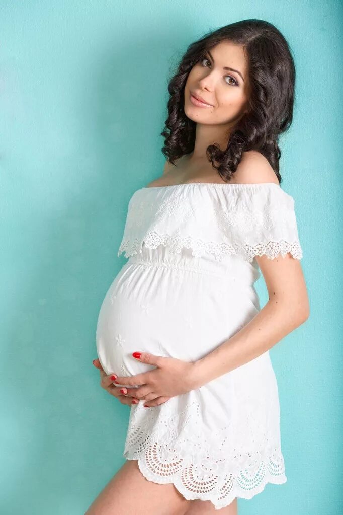 Красивый беременный живот. Красивые беременные. Красивые беременные девушки. Беременская девушка.