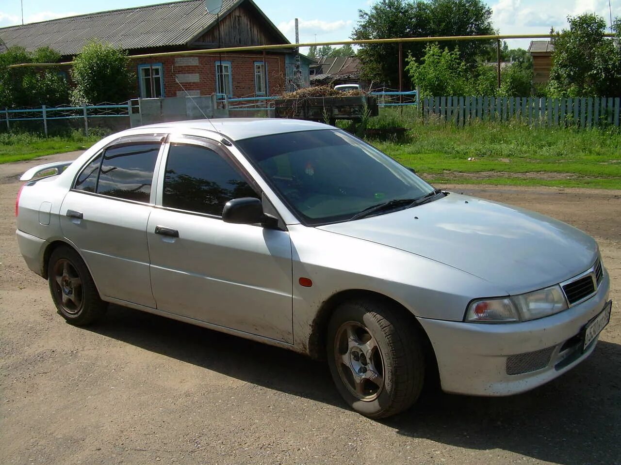 Мицубиси 2000г. Mitsubishi Lancer 2000. Lancer Mitsubishi Lancer 2000. Митсубиси Лансер 2000г. Митсубиси Лансер 2000 года.